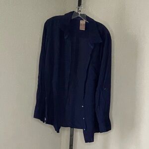 Navy blue blouse. Roll tab sleeves. Can be worn up or down. Soft material.